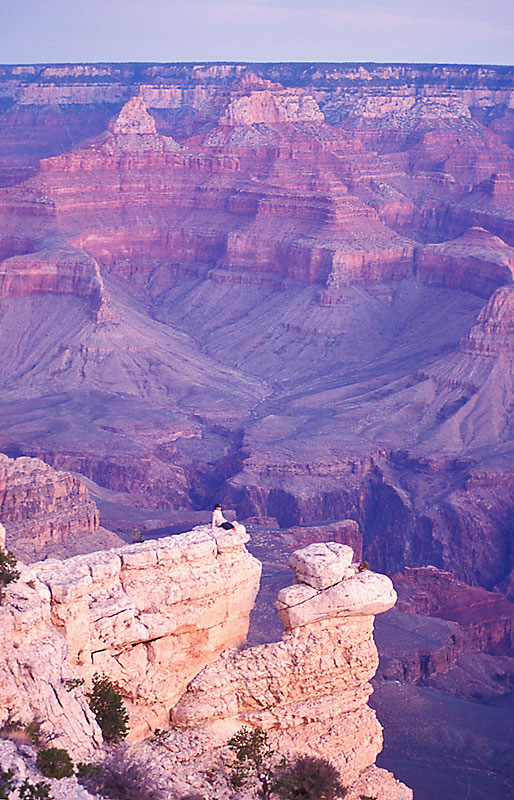 Sitting-on-a-Ledge,-South-Rim,-Grand-Canyon,-AZ,-USA-